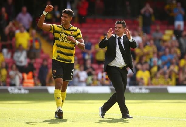 Xisco Munoz, Manager of Watford and Adam Masina of Watford applaud the fans following victory in the Premier League match between Watford and Aston...