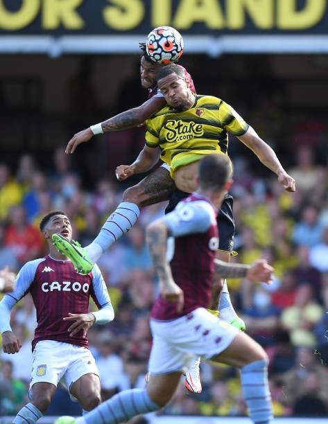 William Troost-Ekong of Watford challenges Tyrone Mings of Aston Villa during the Premier League match between Watford and Aston Villa at Vicarage...