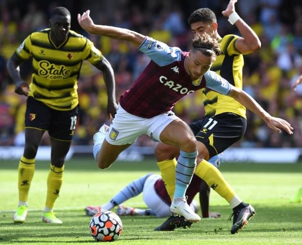 Matthew Cash of Aston Villa is challenged by Adam Masina of Watford during the Premier League match between Watford and Aston Villa at Vicarage Road...