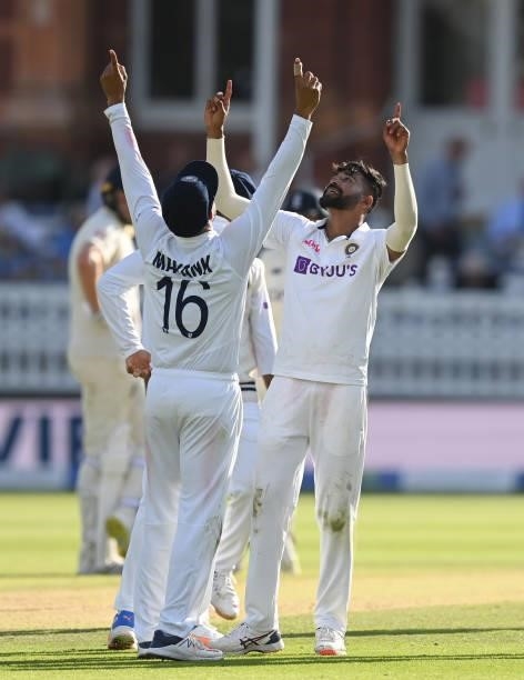 Mohammed Siraj and Mayank Agarwal of India celebrate after the dismissal of Ollie Robinson of England during the third day of the 2nd LV= Test match...