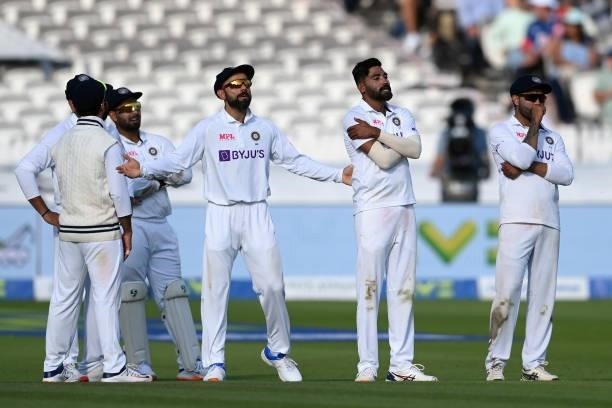 Virat Kohli and Mohammed Siraj of India show their frustration as an lbw review for Joe Root goes against them during the Second LV= Insurance Test...