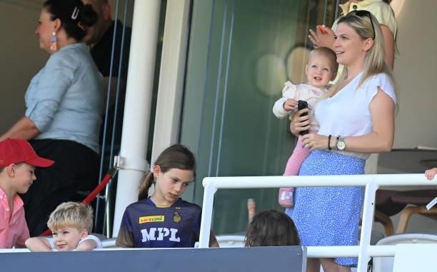 Carrie Root, wife of Joe Root holds their one year-old daughter Isabella as son Alfie Root also looks on during the third day of the 2nd LV= Test...