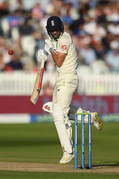 Jimmy Anderson of England fends off a bouncer from Jasprit Bumrah of India during the Second LV= Insurance Test Match: Day Three between England and...