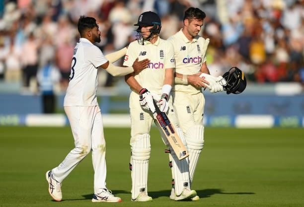 Mohammed Siraj of India congratulates Joe Root of England at the end of the Second LV= Insurance Test Match: Day Three between England and India at...