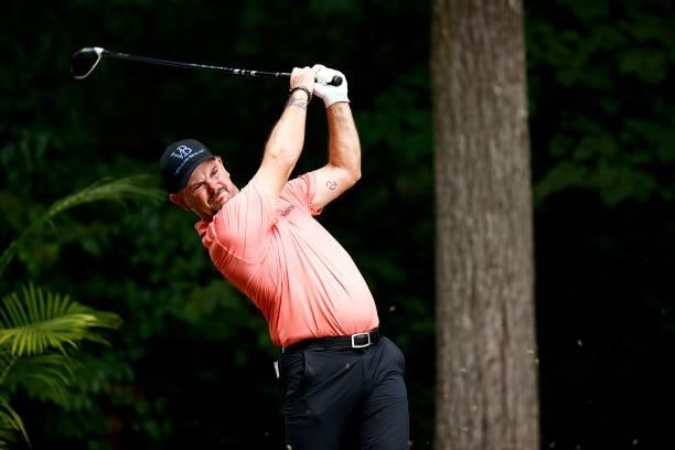 Rory Sabbatini of Slovakia plays his shot from the second tee during the third round of the Wyndham Championship at Sedgefield Country Club on August...
