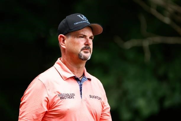 Rory Sabbatini of Slovakia looks on after hitting his shot from the second tee during the third round of the Wyndham Championship at Sedgefield...