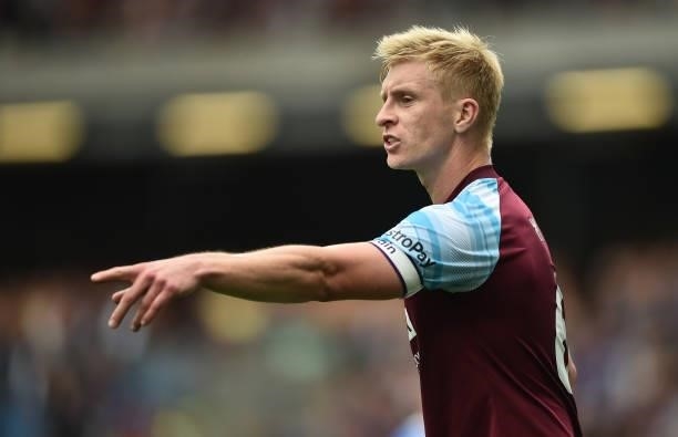 Ben Mee of Burnley gestures during the Premier League match between Burnley and Brighton & Hove Albion at Turf Moor on August 14, 2021 in Burnley,...
