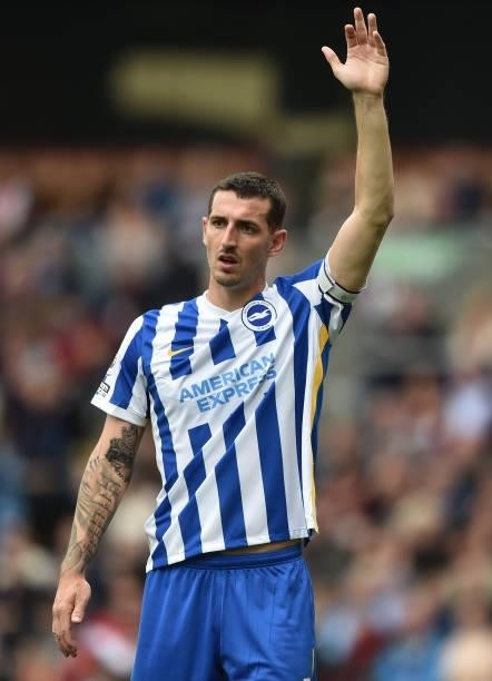 Lewis Dunk of Brighton & Hove gestures during the Premier League match between Burnley and Brighton & Hove Albion at Turf Moor on August 14, 2021 in...