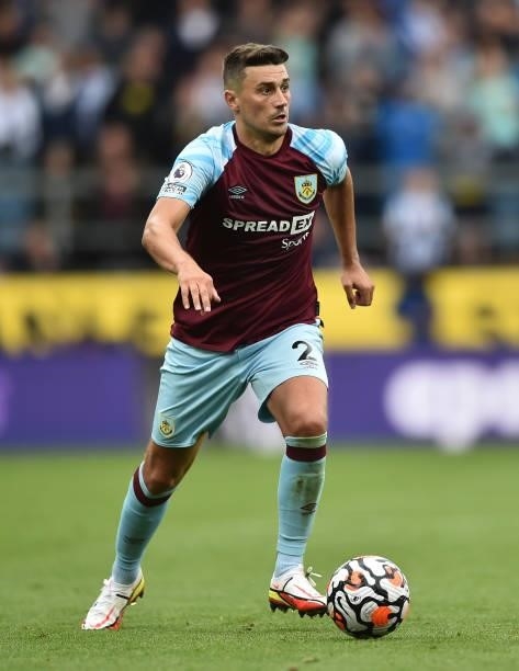 Matthew Lowton of Burnley runs with the ball during the Premier League match between Burnley and Brighton & Hove Albion at Turf Moor on August 14,...