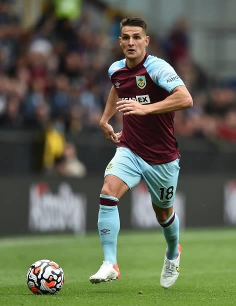 Ashley Westwood of Burnley runs with the ball during the Premier League match between Burnley and Brighton & Hove Albion at Turf Moor on August 14,...
