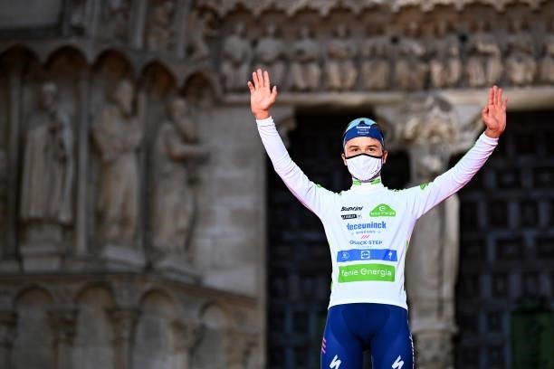 Andrea Bagioli of Italy and Team Deceuninck - Quick-Step celebrates winning the white best young jersey on the podium ceremony after the 76th Tour of...