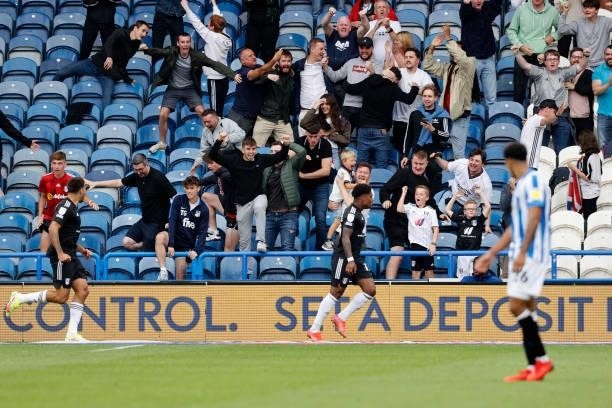Ivan Cavaleiro of Fulham celebrates with the travelling fans after scoring during the Sky Bet Championship match between Huddersfield Town and Fulham...