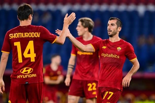 Henrikh Mkhitaryan celebrates after scoring the third goal of his team with teammates during the pre-season friendly match between AS Roma and Raja...