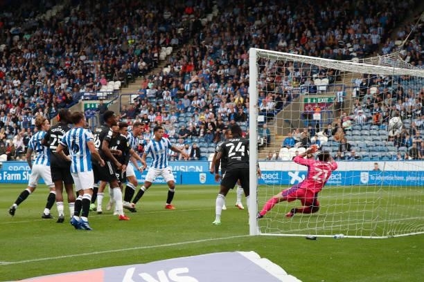 Matty Pearson of Huddersfield Town scores with a header during the Sky Bet Championship match between Huddersfield Town and Fulham at Kirklees...