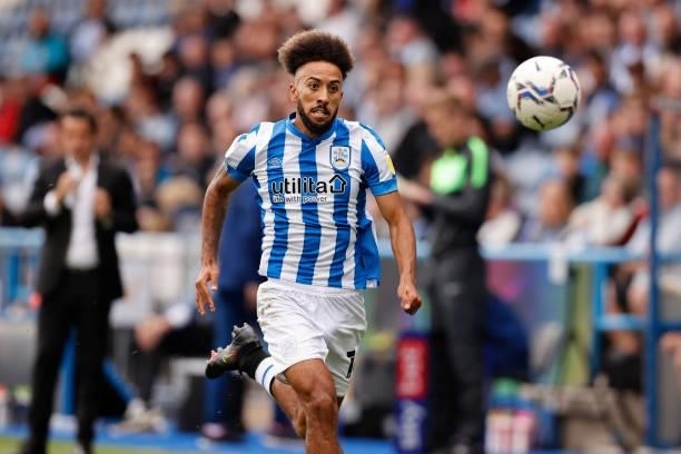 Sorba Thomas of Huddersfield Town chases a bouncing ball during the Sky Bet Championship match between Huddersfield Town and Fulham at Kirklees...