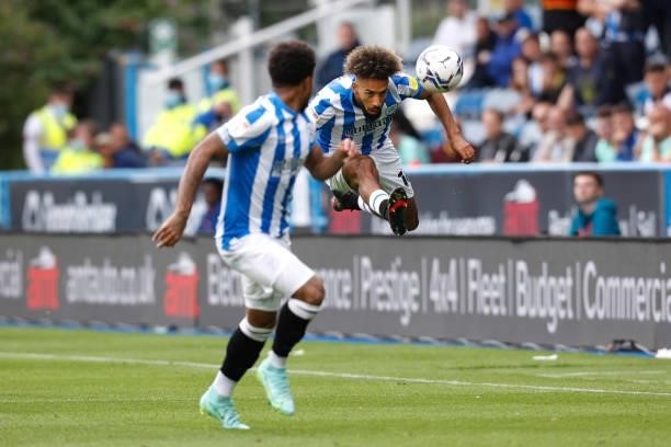 Sorba Thomas of Huddersfield Town plays through a bouncing ball during the Sky Bet Championship match between Huddersfield Town and Fulham at...