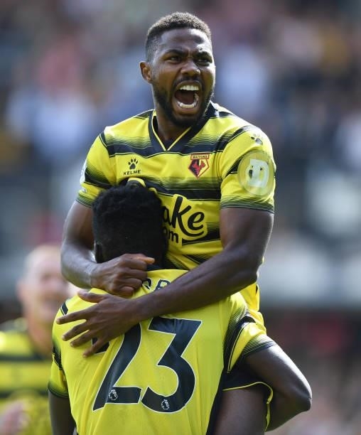 Emmanuel Dennis of Watford celebrates scoring their first goal during the Premier League match between Watford and Aston Villa at Vicarage Road on...