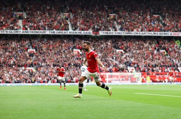 Bruno Fernandes celebrates scoring his teams third goal during the Premier League match between Manchester United and Leeds United at Old Trafford on...