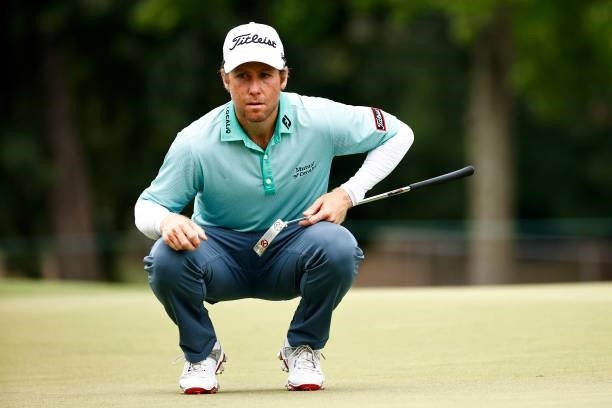 Tyler Duncan of the United States lines up a putt during the third round of the Wyndham Championship at Sedgefield Country Club on August 14, 2021 in...