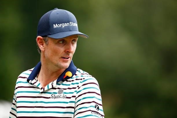 Justin Rose of England looks on as he walks off the 18th grene during the third round of the Wyndham Championship at Sedgefield Country Club on...