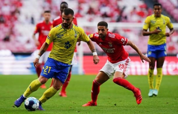 Leandro Silva of FC Arouca with Adel Taarabt of SL Benfica in action during the Liga Bwin match between SL Benfica and FC Arouca at Estadio da Luz on...