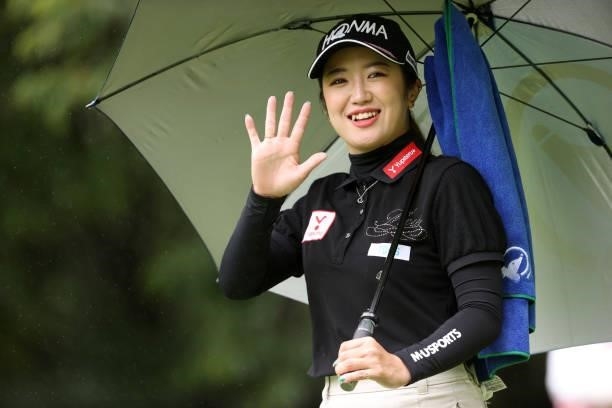 Nanoko Hayashi of Japan waves on the 11th hole during the final round of the NEC Karuizawa 72 Golf Tournament at Karuizawa 72 Golf Kita Course on...