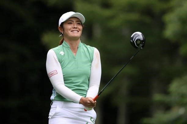 Ayaka Watanabe of Japan smiles on the 14th tee during the final round of the NEC Karuizawa 72 Golf Tournament at Karuizawa 72 Golf Kita Course on...