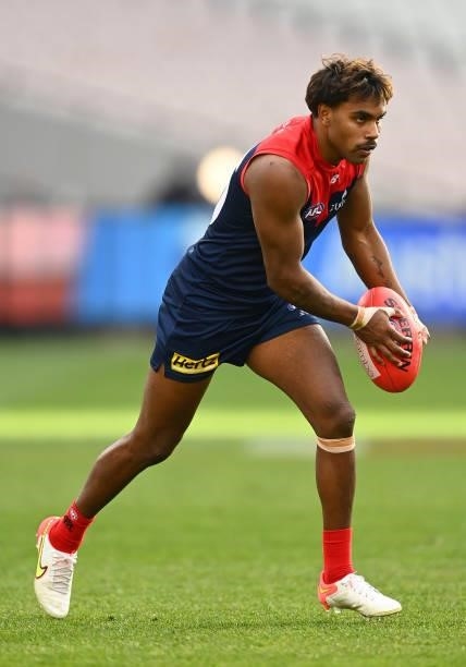 Kysaiah Pickett of the Demons kicks during the round 22 AFL match between Melbourne Demons and Adelaide Crows at Melbourne Cricket Ground on August...