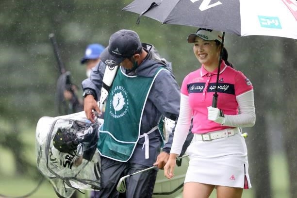 Sakura Koiwai of Japan smiles on the 14th hole during the final round of the NEC Karuizawa 72 Golf Tournament at Karuizawa 72 Golf Kita Course on...