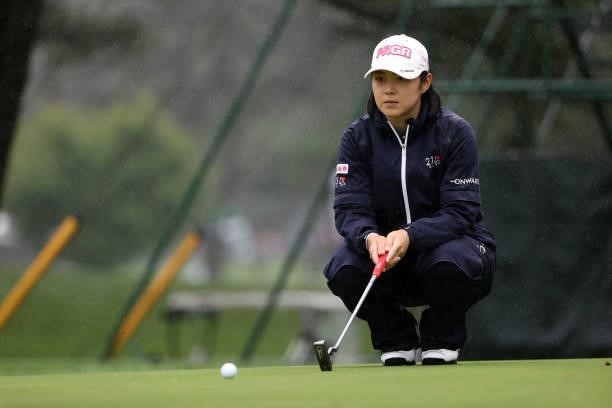 Rie Tsuji of Japan lines up a putt on the 14th green during the final round of the NEC Karuizawa 72 Golf Tournament at Karuizawa 72 Golf Kita Course...
