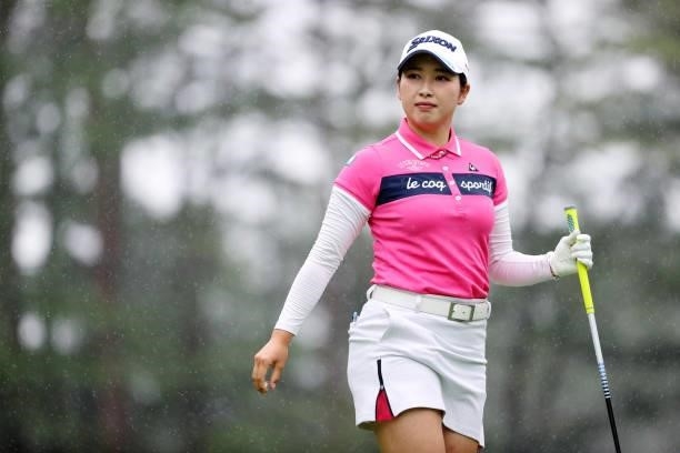 Sakura Koiwai of Japan reacts after her tee shot on the 15th hole during the final round of the NEC Karuizawa 72 Golf Tournament at Karuizawa 72 Golf...