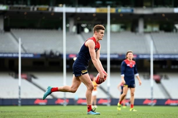 Bayley Fritsch of the Demons kicks during the round 22 AFL match between Melbourne Demons and Adelaide Crows at Melbourne Cricket Ground on August...