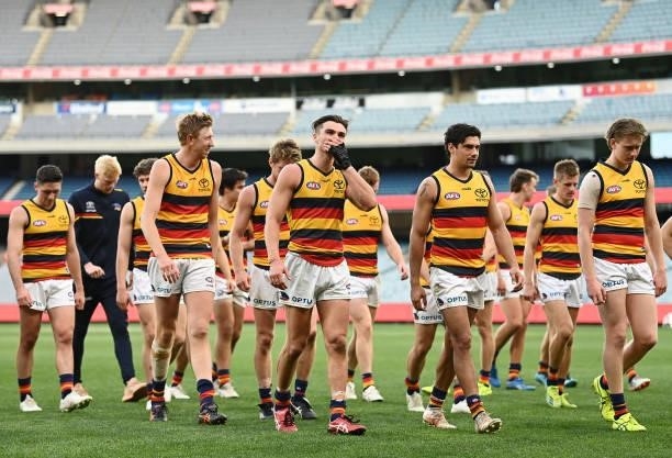 The Crows look dejected after losing the round 22 AFL match between Melbourne Demons and Adelaide Crows at Melbourne Cricket Ground on August 15,...
