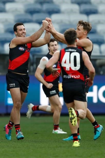 Alec Waterman of the Bombers celebrates a goal during the round 22 AFL match between Gold Coast Suns and Essendon Bombers at GMHBA Stadium on August...