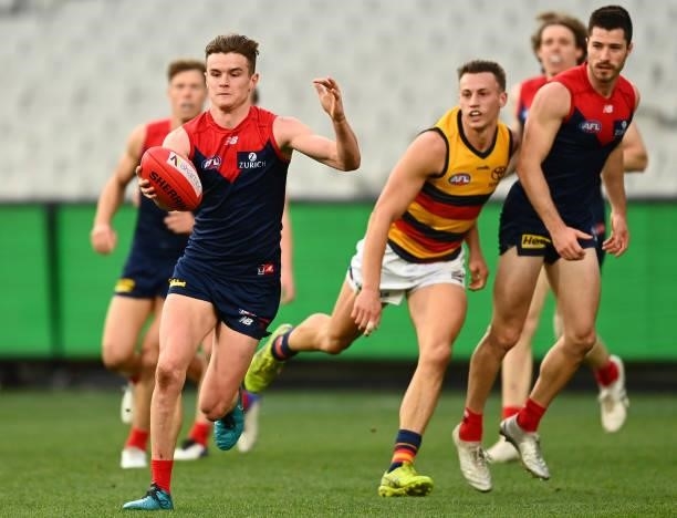 Bayley Fritsch of the Demons kicks for goal during the round 22 AFL match between Melbourne Demons and Adelaide Crows at Melbourne Cricket Ground on...