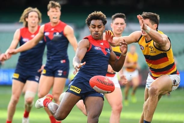 Kysaiah Pickett of the Demons kicks during the round 22 AFL match between Melbourne Demons and Adelaide Crows at Melbourne Cricket Ground on August...