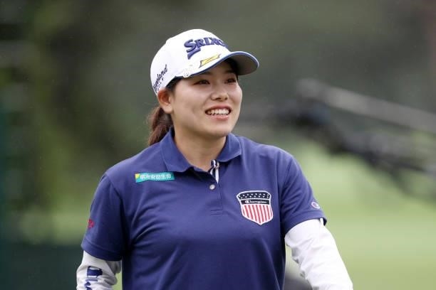 Minami Katsu of Japan smiles after holing out on the 18th green during the final round of the NEC Karuizawa 72 Golf Tournament at Karuizawa 72 Golf...