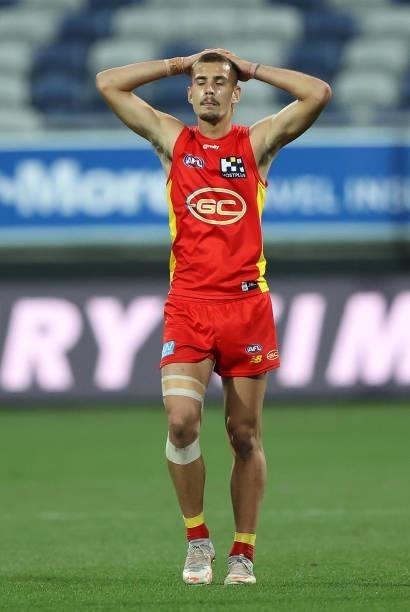 Charlie Ballard of the Suns reacts after the Suns were defeated by the Bombers during the round 22 AFL match between Gold Coast Suns and Essendon...