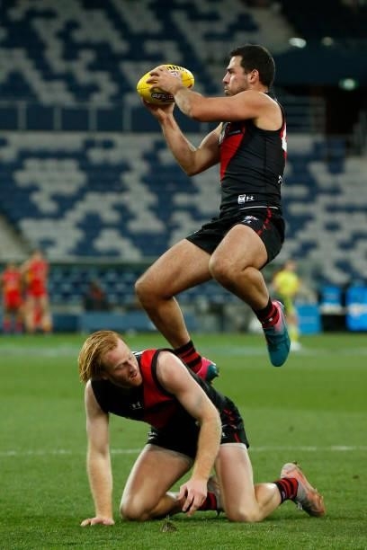 Alec Waterman of the Bombers marks the ball during the round 22 AFL match between Gold Coast Suns and Essendon Bombers at GMHBA Stadium on August 15,...