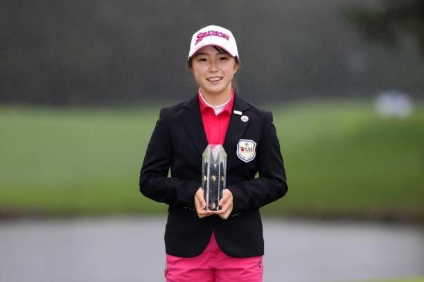 Low amateur Ayaka Tezuka of Japan poses with the trophy after the final round of the NEC Karuizawa 72 Golf Tournament at Karuizawa 72 Golf Kita...