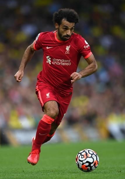 Mohamed Salah of Liverpool runs with the ball during the Premier League match between Norwich City and Liverpool at Carrow Road on August 14, 2021 in...
