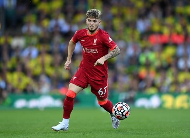 Harvey Elliott of Liverpool runs with the ball during the Premier League match between Norwich City and Liverpool at Carrow Road on August 14, 2021...