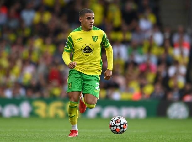 Max Aarons of Norwich City runs with the ball during the Premier League match between Norwich City and Liverpool at Carrow Road on August 14, 2021 in...