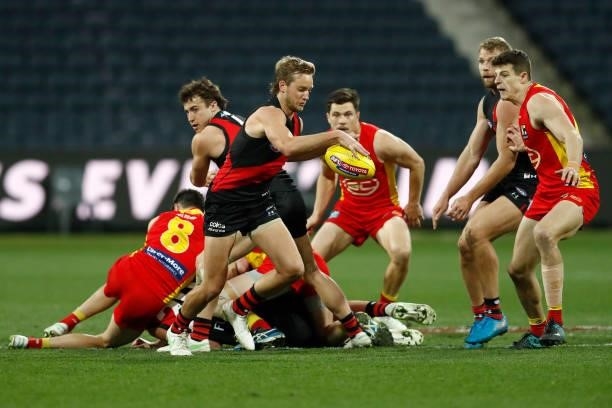 Darcy Parish of the Bombers kicks the ball during the round 22 AFL match between Gold Coast Suns and Essendon Bombers at GMHBA Stadium on August 15,...
