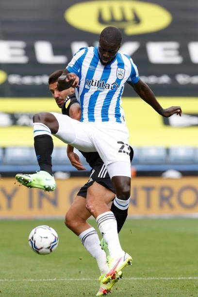 Naby Sarr of Huddersfield Town during the Sky Bet Championship match between Huddersfield Town and Fulham at Kirklees Stadium on August 14, 2021 in...
