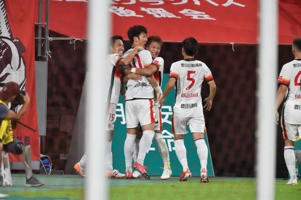 Min Tae of Nagoya Grampus celebrates scoring his side's first goal with his teammate during the J.League Meiji Yasuda J1 match between Nagoya Grampus...