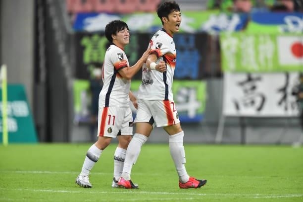Min Tae of Nagoya Grampus celebrates scoring his side's first goal with his teammate Yuki SOMA during the J.League Meiji Yasuda J1 match between...