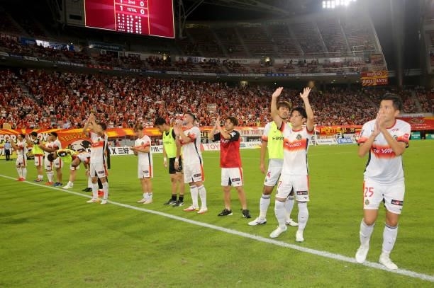 Nagoya Grampus players applaud fans after their 1-0 victory in the J.League Meiji Yasuda J1 match between Nagoya Grampus and Shonan Bellmare at the...