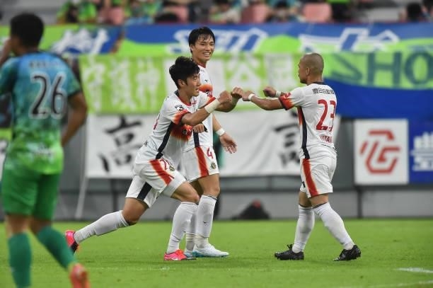 Min Tae of Nagoya Grampus fist bumps with Yutaka YOSHIDA during the J.League Meiji Yasuda J1 match between Nagoya Grampus and Shonan Bellmare at the...