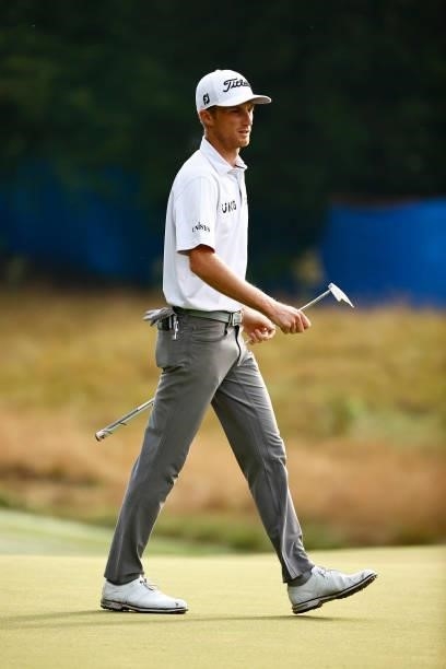 Will Zalatoris of the United States walks across the first green during the final round of the Wyndham Championship at Sedgefield Country Club on...